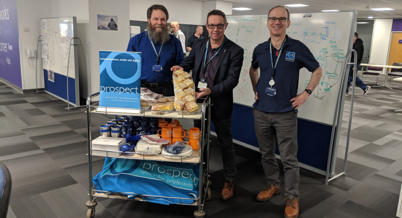 Union Week 2018 Noel McClean (centre) with Martin Aylett and Alan Smith giving out cake at Adastral Park