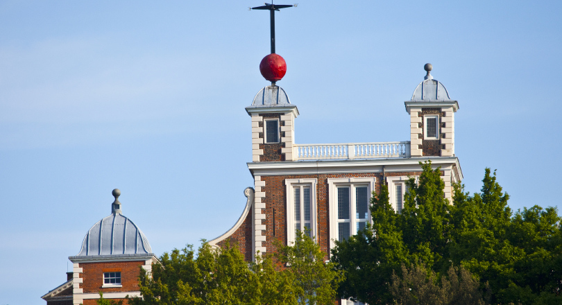 View of rooftops and time ball at the Royal Observatory, Greenwich, south east London